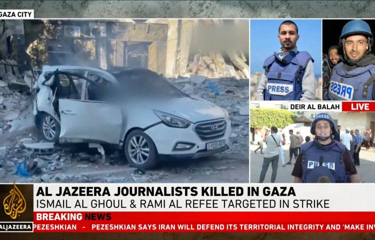 A screenshot of a news segment. Images include the struck car of the journalists, the two journalists in blue press vests, and a third reporter speaking live. Text on screen reads "Al Jazeera Journalists Killed In Gaza" and "Ismail Al Ghoul and Rami Al Refee Targeted In Strike."